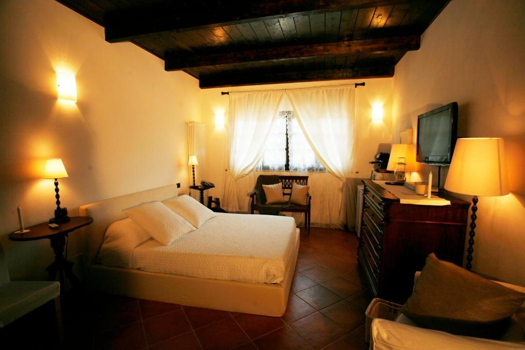 Aparthotel La Maragliana Castel Rocchero Pokoj fotografie
