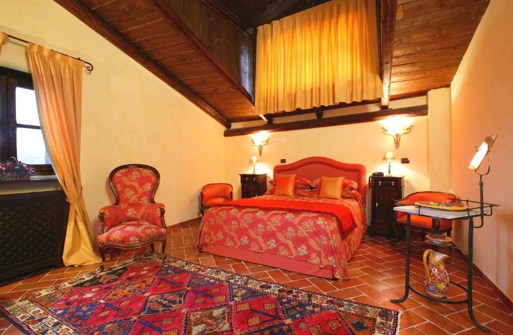 Aparthotel La Maragliana Castel Rocchero Pokoj fotografie